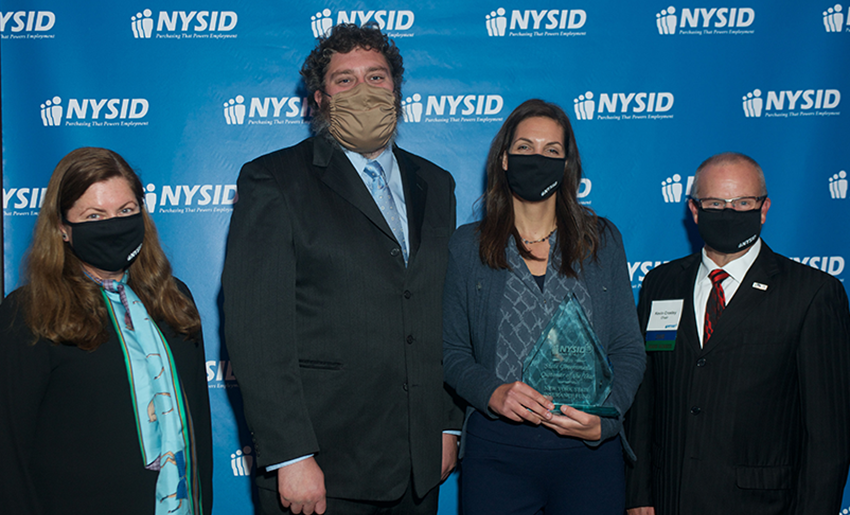 Photo (l.-r.): New York State Industries for the Disabled President & CEO Maureen O’Brien, NYSIF's James Dooley and Melissa Jensen, NYSID Past Chairman Kevin Crosley at the NYSID Customer of the Year award presentation to NYSIF. 